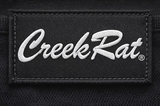 Clean embroidered black patch with white stitching